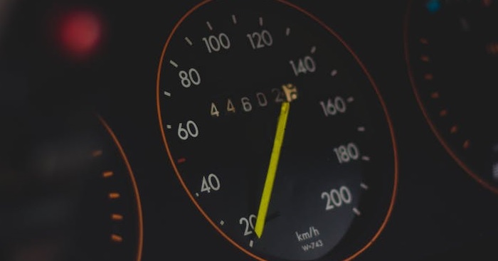 Speedometer showing car mileage